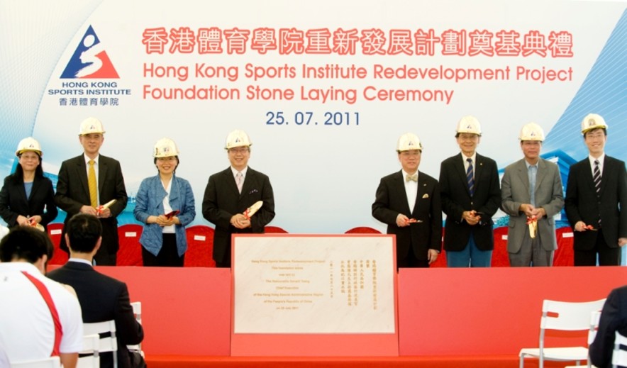 <p>The construction work of the new building superstructures of the Hong Kong Sports Institute (HKSI) Redevelopment Project has commenced. A foundation stone laying ceremony for the third and largest construction phase is held today at the HKSI. The officiating guests include The Hon Donald Tsang (4<sup>th</sup> from right), Chief Executive of HKSAR; Dr Eric Li (4<sup>th</sup> from left), Chairman of the HKSI; Florence Hui (3<sup>rd</sup> from left), Acting Secretary for Home Affairs; Pang Chung (3<sup>rd</sup> from right), Hon Secretary General of the Sports Federation &amp; Olympic Committee of Hong Kong, China; Prof Frank Fu (2<sup>nd</sup> from left), Chairman of Elite Sports Committee; Wai Kwok-hung (2<sup>nd</sup> from right), Chairman of Sha Tin District Council; Marigold Lau (1<sup>st</sup> from left), Director of Architectural Services; and Bobby Cheng (1<sup>st</sup> from right), Acting Director of Leisure and Cultural Services.</p>
