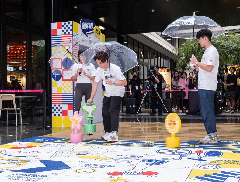 <p>(From left) Squash player Ho Tze-lok, gymnast Shek Wai-hung and fencer Ng Lok-wang participated in the giant board game at the interactive exhibition of the Jockey Club Sports PLUS Elite Athletes Community Programme and shared their inspirational stories of being elite athletes with the public.</p>
