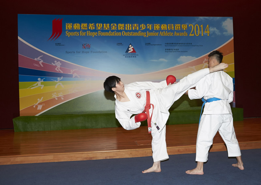 <p>Karatedo athlete Chan Ho-hong (right) and Wai Kwok-ying (left), demonstrate their sports talent in front of more than a hundred guests, coaches, athletes and students.</p>
