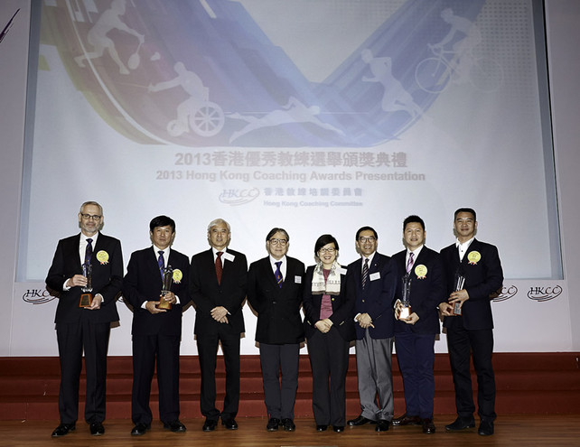 Group photo of presenters and recipients of the Coach of the Year Awards of the 2013 Hong Kong Coaching Awards (from left): swimming coach Michael Peter Fasching (junior athletes, individual sport category); cycling coach Shen Jinkang (senior athletes, individual sport category); Professor Frank Fu MH JP, Chairman of the Hong Kong Coaching Committee; Mr Timothy Fok GBS JP, President of the Sports Federation & Olympic Committee of Hong Kong, China; Ms Florence Hui SBS JP, Acting Secretary for Home Affairs; Mr Carlson Tong JP, Chairman of the HKSI; squash coach Dick Leung Kan-fai (junior athletes, team event category); and wheelchair fencing coach Chen Yu (senior athletes, team event category).
