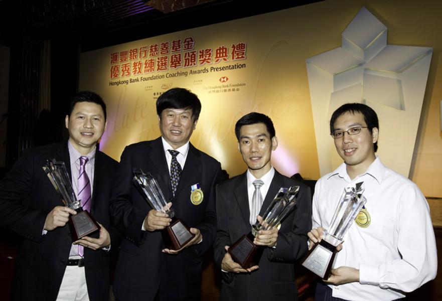 <p>The awardees of 2011 Hongkong Bank Foundation Coaching Awards cycling coach Shen Jinkang (2<sup>nd</sup> from left), recipient of Distinguished Services Award for Coaching; and recipients of Coach of the Year Award, including (from left) squash coach Leung Kan-fai; wushu coach Wong Chi-kwong; and swimming coach for the mentally handicapped Kam Chi-ho, are all thrilled with joy.</p>
