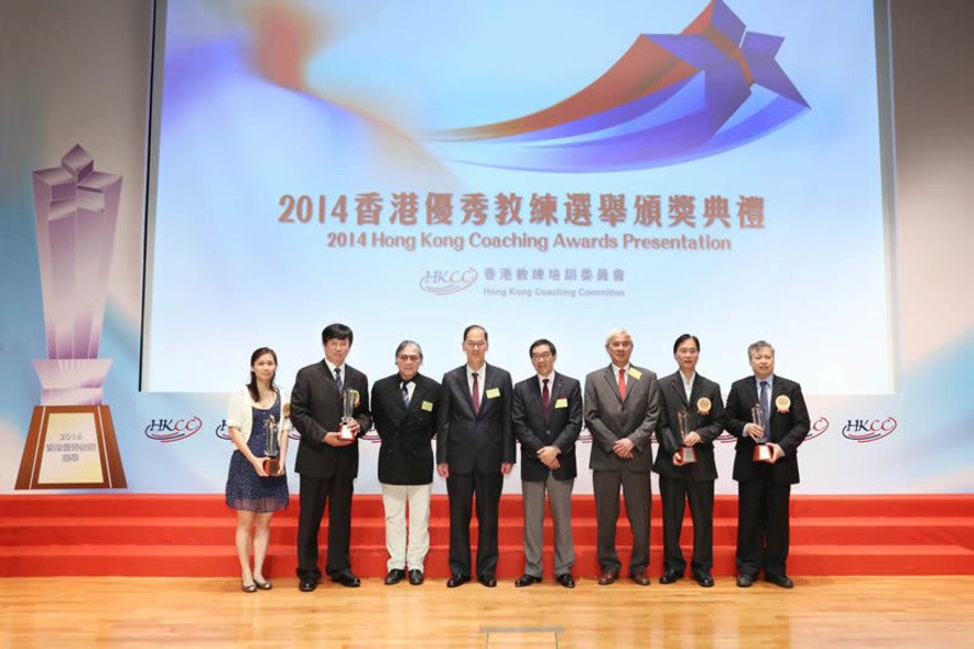 <p>Group photo of presenters and recipients of the Coach of the Year Awards of the 2014 Hong Kong Coaching Awards (from left): squash coach Chiu Wing-yin Rebecca (senior athletes, team event); cycling coach Shen Jinkang (senior athletes, individual sport); Mr Timothy Fok GBS JP, President of the Sports Federation &amp; Olympic Committee of Hong Kong, China; Mr Tsang Tak-sing GBS JP, Secretary for Home Affairs; Mr Carlson Tong SBS JP, Chairman of the Hong Kong Sports Institute; Professor Frank Fu MH JP, Chairman of the Hong Kong Coaching Committee; boccia coach Kwok Hart-wing (senior athletes, team event); and wushu coach Law Kin-keung (junior athletes, individual sport).</p>
