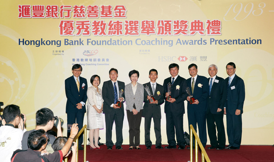 <p>The four Coach of the Year Award winners, cycling coach Shen Jinkang (senior athletes, individual sport) (4<sup>th</sup>&nbsp;from right), wheelchair fencing coach Wang Ruiji (senior athletes, team event) (3<sup>rd</sup>&nbsp;from right), wushu coach Wong Chi-kwong (junior athletes, individual sport) (5<sup>th</sup>&nbsp;from left) and badminton coach Tim He (junior athletes, team event) (3<sup>rd</sup>&nbsp;from left) were honoured at the 2012 Hongkong Bank Foundation Coaching Awards Presentation Ceremony with distinguished guests, including The Hon Mrs Carrie Lam (4<sup>th</sup>&nbsp;from left), Chief Secretary for Administration of the Hong Kong Special Administrative Region; Mr Pang Chung (1<sup>st</sup>&nbsp;from left), Hon. Secretary General of the Sports Federation &amp; Olympic Committee of Hong Kong, China; Dr James Lam (1<sup>st</sup>&nbsp;from right), Board of Director of the Hong Kong Sports Institute and Chairman of Coaching Awards Sub-committee; Professor Frank Fu (2<sup>nd</sup>&nbsp;from right), Chairman of the Hong Kong Coaching Committee; and Ms Kathy Wong (2<sup>nd</sup>&nbsp;from left), Secretary of the Advisory Committee of the Hongkong Bank Foundation.</p>

