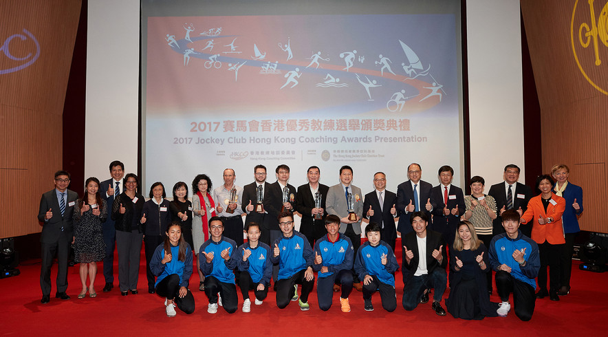 <p>The officiating guests Mr Lau Kong-wah JP, Secretary for Home Affairs (back row, 7<sup>th</sup> from the right); Ms Rhoda Chan, Head of Charities Project (Grant Making &ndash; Sports, Recreation, Arts and Culture) of The Hong Kong Jockey Club (back row, 6<sup>th</sup> from the left); Ms Vivien Lau BBS&nbsp;JP, Chairman of the Hong Kong Coaching Committee (back row, 7<sup>th</sup> from the left) and Dr Lam Tai-fai SBS&nbsp;JP, Chairman of the Hong Kong Sports Institute (back row, 6<sup>th</sup> from the right) took a group photo with the Coach of the Year awardees including Lam Chi-pang (back row, middle), Wang Chang-yong (back row, 9<sup>th</sup> from the right), Leung Kan-fai (back row, 8<sup>th</sup> from the right), together with other guests and athletes on stage.</p>
