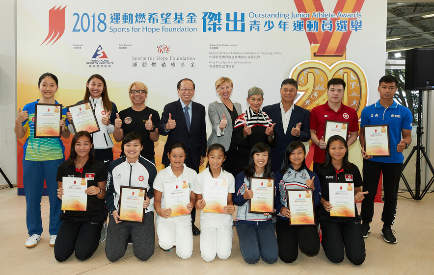 <p>Officiating guests including Miss Marie-Christine Lee, founder of the Sports for Hope Foundation (back row, 4<sup>th</sup> right); Mr Pui Kwan-kay SBS MH, Vice-President of the Sports Federation &amp; Olympic Committee of Hong Kong, China (back row, 4<sup>th</sup> left); Mr Raymond Chiu, Vice Chairman of the Hong Kong Sports Press Association (backrow, 3<sup>rd</sup> left); and Dr Trisha Leahy BBS, Chief Executive of the Hong Kong Sports Institute (back row, middle), took a group photo with the recipients.</p>
