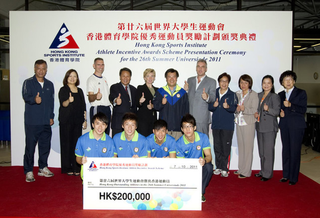 A group photo of Dr Trisha Leahy (back row 5th from left), Chief Executive of HKSI; Dr Patrick Chan (back row middle), Head of the Hong Kong, China Delegation to the Games; William Ko, Senior Vice President of Hong Kong Amateur Athletic Association (back row 4th from left); Professor Cheung Siu-yin (back row 2nd from right), Chairperson of The Gymnastics Association of Hong Kong, China; together with other guests and Hong Kong medallists of the 26th Summer Universiade 2011.