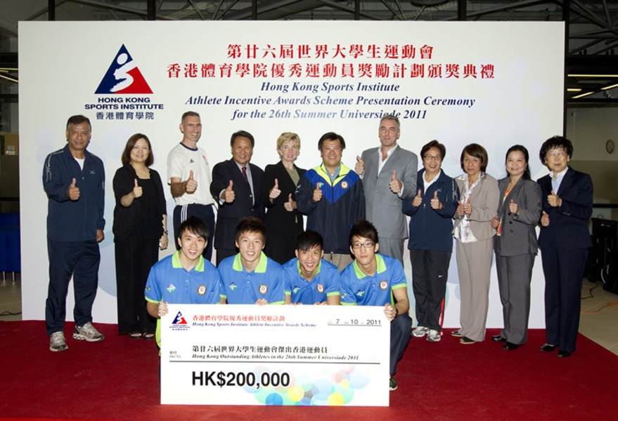 A group photo of Dr Trisha Leahy (back row 5th from left), Chief Executive of HKSI; Dr Patrick Chan (back row middle), Head of the Hong Kong, China Delegation to the Games; William Ko, Senior Vice President of Hong Kong Amateur Athletic Association (back row 4th from left); Professor Cheung Siu-yin (back row 2nd from right), Chairperson of The Gymnastics Association of Hong Kong, China; together with other guests and Hong Kong medallists of the 26th Summer Universiade 2011.