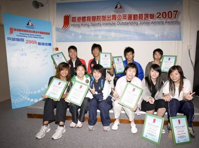 Group photo of all Outstanding Junior Athletes of 2007 after autographing the signing board.