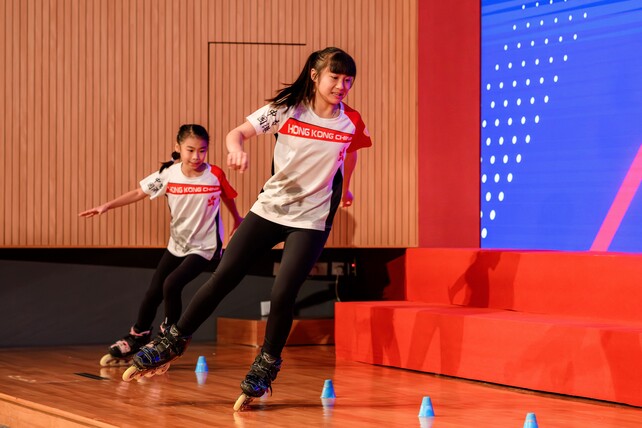 Roller sports athlete Li Yuet-yi (left) and Chan Yin-lam Sevina (right) showcase their skills in classic slalom.