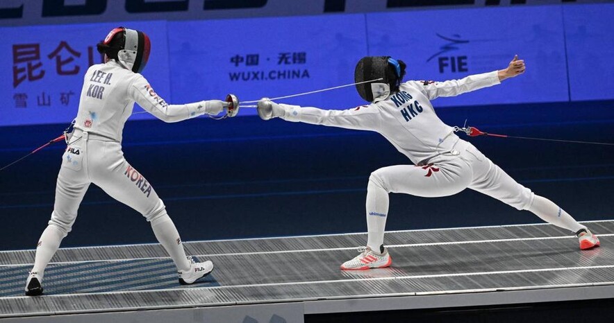Kong Man-wai (right) (photo: International Fencing Federation)