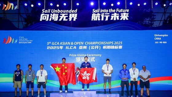 Nicholas Bezy Halliday (middle)&nbsp;(Photo: Chinese Yachting